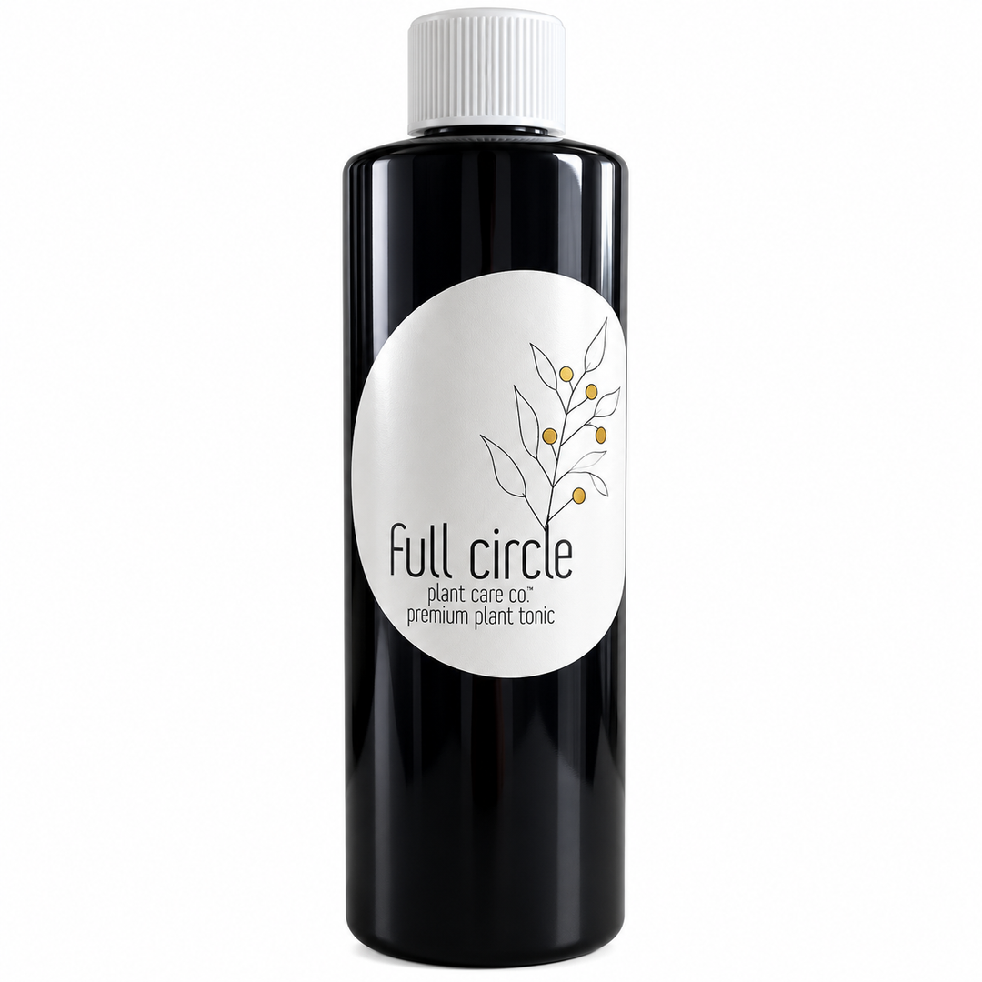 Full Circle Premium Plant Tonic 16 oz black bottle with white cap, organic worm casting-based plant tonic for orchids and houseplants.