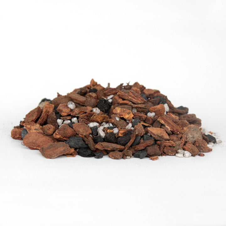 Orchid Nerd Grab &amp; Grow Bag  filled with all-purpose orchid Pot, ting mix made from fir bark, charcoalSponge rock, and coconut husk for rePot, ting up to 5 orchids.