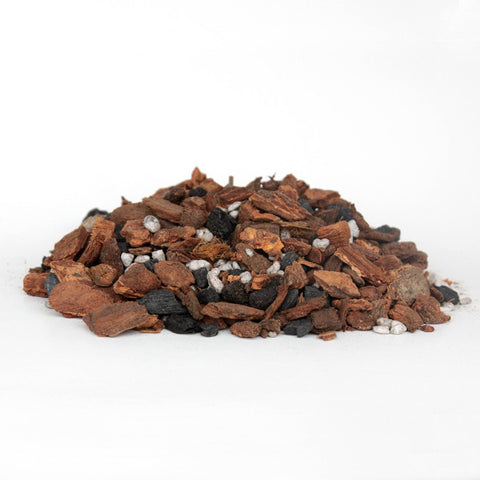 Orchid Nerd Grab & Grow Bag  filled with all-purpose orchid potting mix made from fir bark, charcoal, sponge rock, and coconut husk for repotting up to 5 orchids.