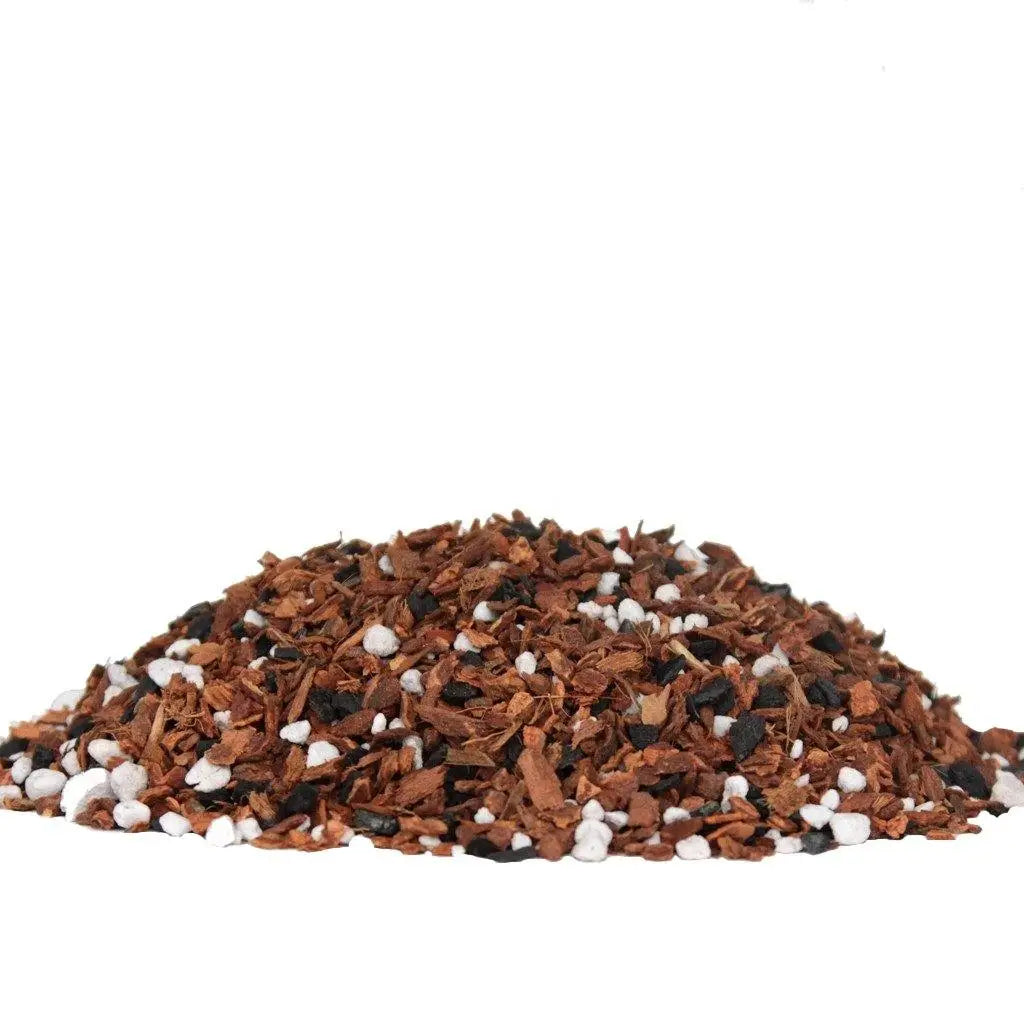 Orchid Nerd seedling orchid potting mix in a 2 cubic foot box with fine bark, sponge rock, coconut husk, and additives for young and miniature orchids.